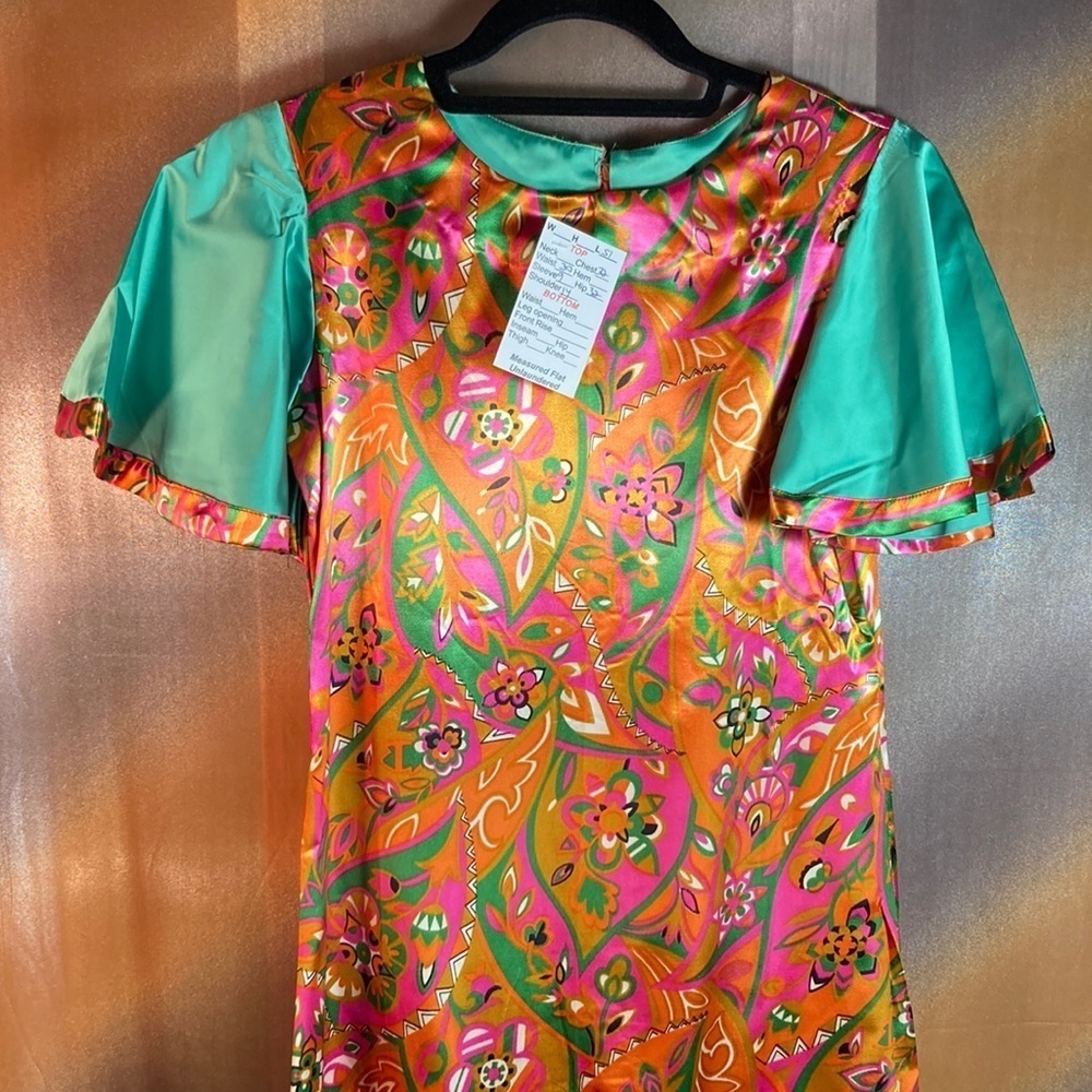 1970’s orange, green & pink satin long dress. 51” length. 32” chest. 120